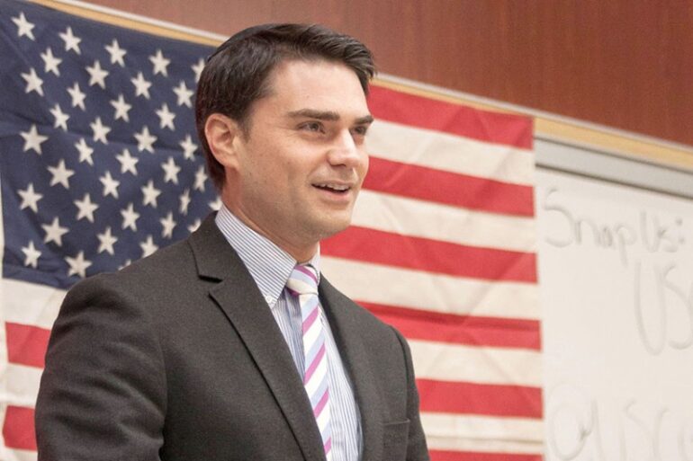 Ben Shapiro in front of an American flag