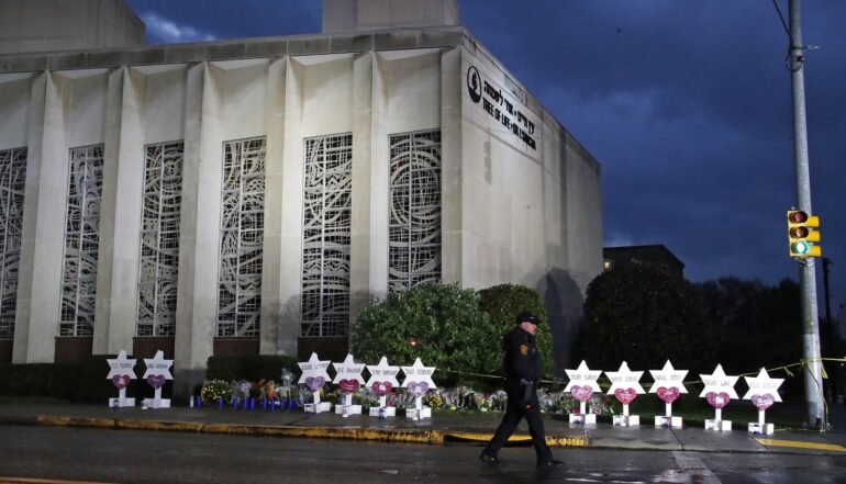 Thoughts and prayers aren't enough. Tree of life synagogue with memorials for the murdered