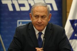 Prime Minister Binyamin Netanyahu at Likud faction meeting, determined to keep building Jewish communities in the West Bank despite international pressure