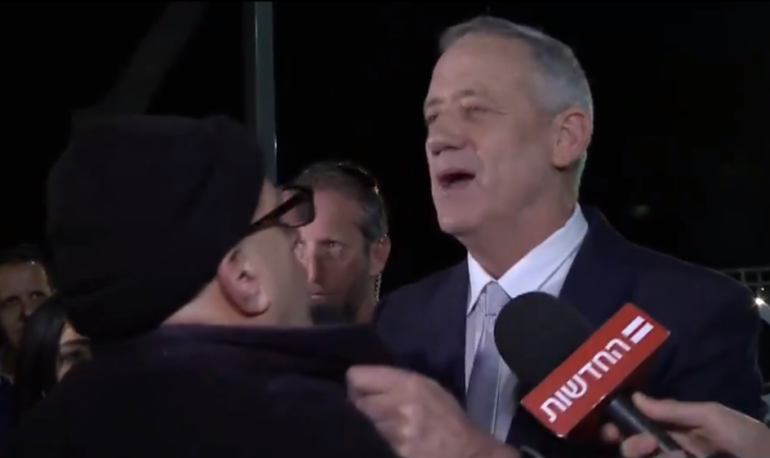 Benny Gantz putting hands on Elie Yosef who confronted him about arms sales to South Sudan