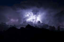 "Seeing Thunder" by Yonah ben-Avraham - lightning over mountains