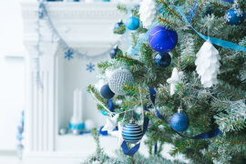 Christmas tree decorated with blue and silver balls