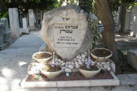 Sharona Eshet-Kohen and Yehuda HaKohen discuss Avraham Stern's political tendencies - image of the grave of Yair