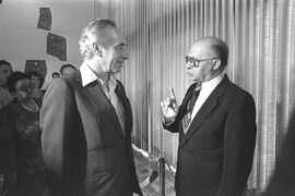 Shimon Peres and Menahem Begin after the 1977 election