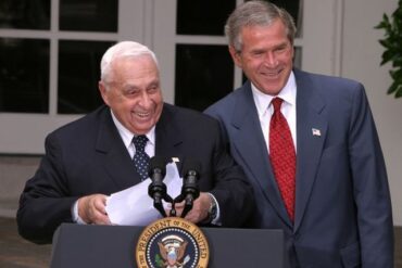 Ariel Sharon & George W. Bush, who implemented the 2005 Disengagement from Gaza