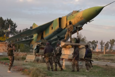 Syrian rebels at Hama Military Airport after its capture in the 2024 Hama offensive